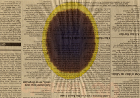 scan of ink drop on newspaper