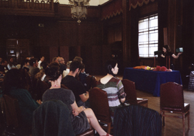 photo of demonstration at 'What Work Does the Work of Art Do?' symposium